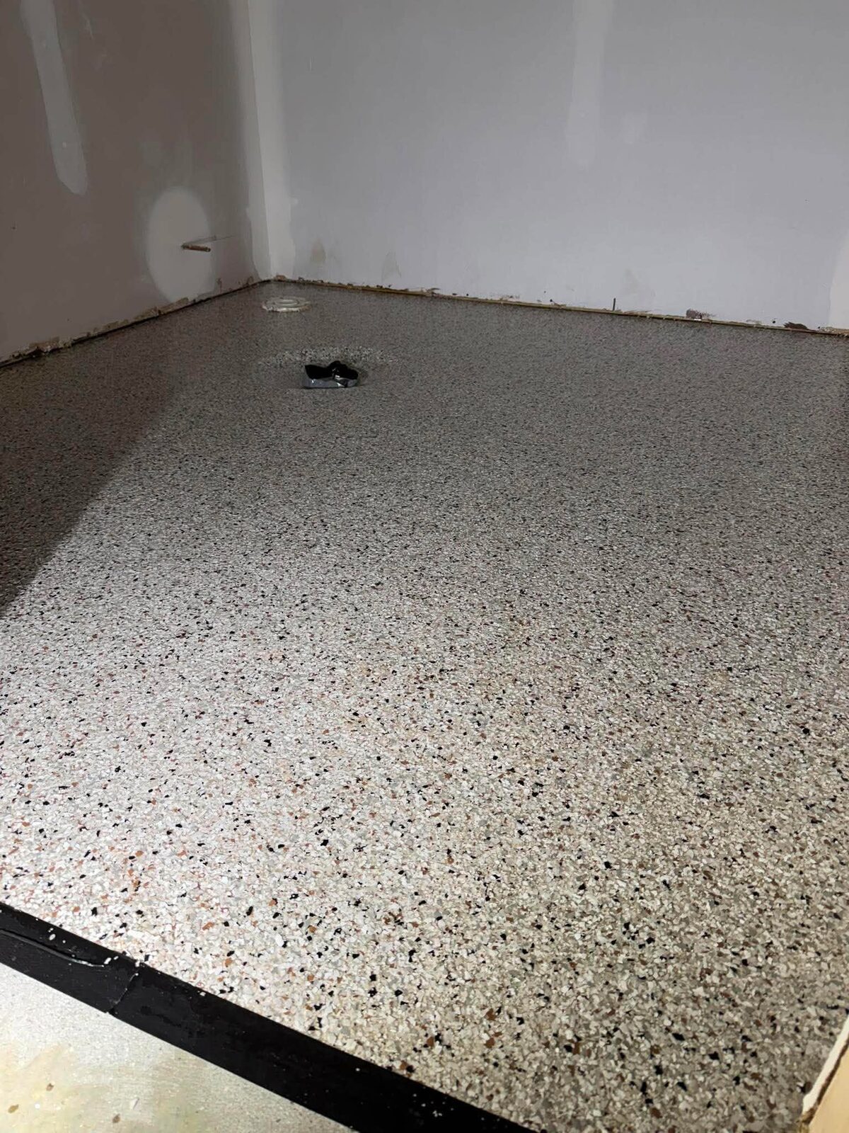 Tan flake epoxy garage floor