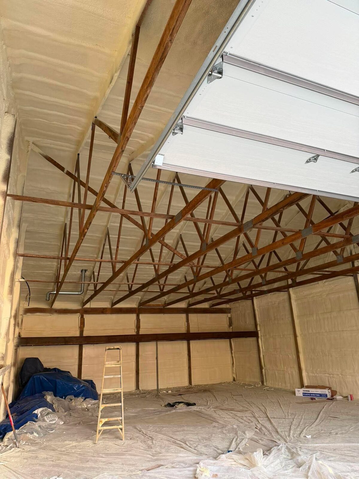 Spray foam on pole barn ceiling and trusses